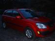 Bail pour Kia Rio 2006 Rouge