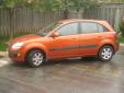 Bail pour Kia Rio 2006 Orange